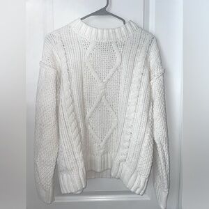 white cable knit sweater